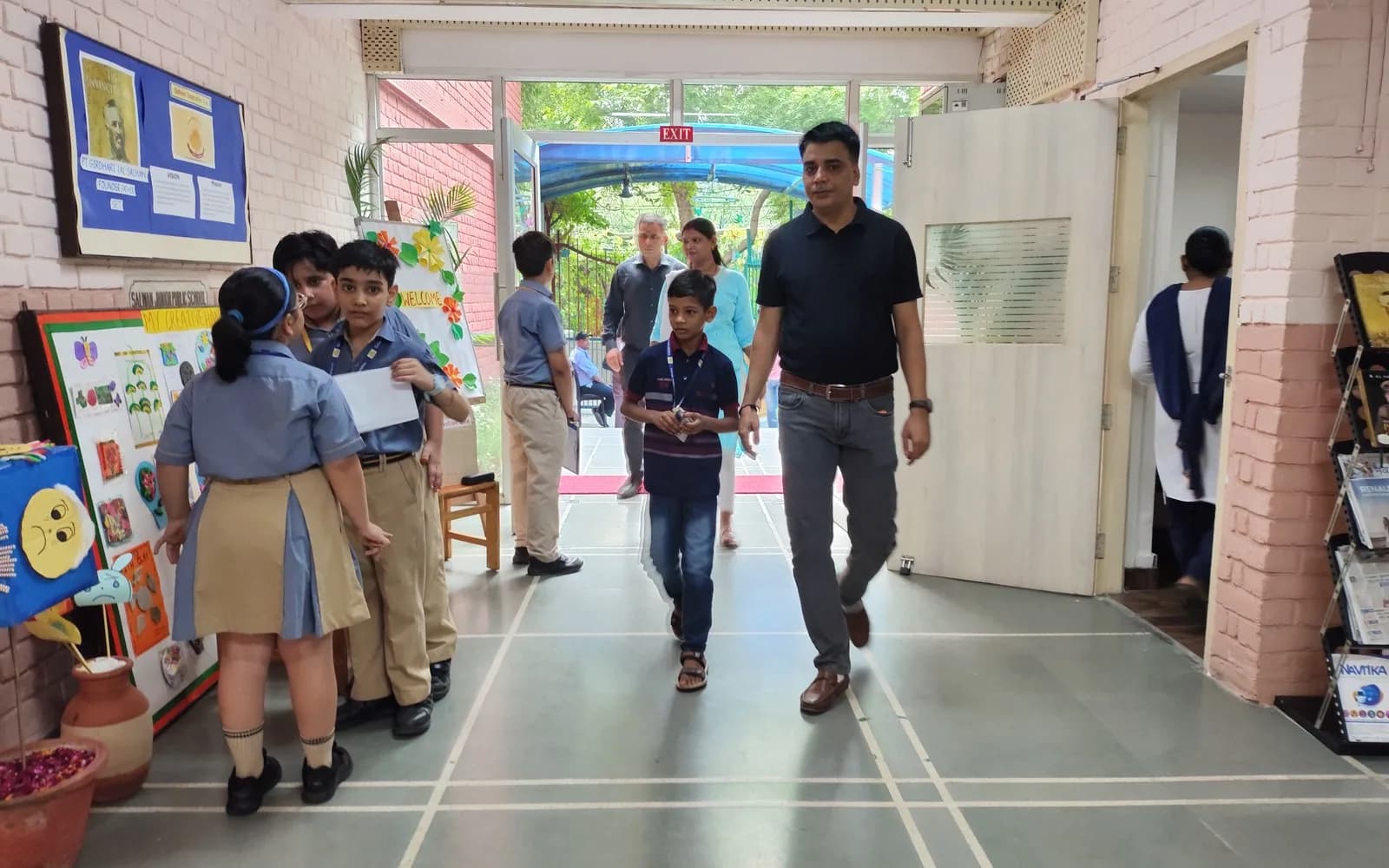 A family being welcomed during the Salwan Junior School admission process